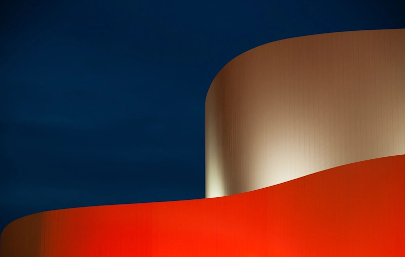 Abstract Blue, Gold, and Red Curves representing Executive Resilience